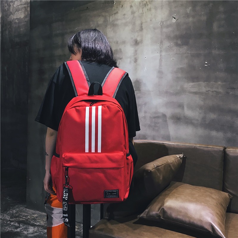 Nueva lona de tres barras mochila de moda coreana mochila de escuela secundaria mochila de viaje para hombres y mujeres mochila de escuela secundaria