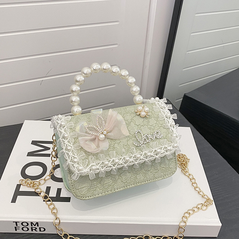 Nuevo tipo de bolso para niños, moda perla portátil, bolso de hombro de la princesa Aisha, estilo extranjero, bolso de hombro para niñas lindas