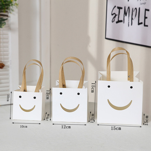 Simple gift bag with smiley face baking packaging bag cake square bottom hand bag kraft paper hand gift bag
