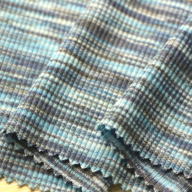 锻彩罗纹螺纹布针织纬编服装面料TC涤棉色织锻彩段彩2x2罗纹布料