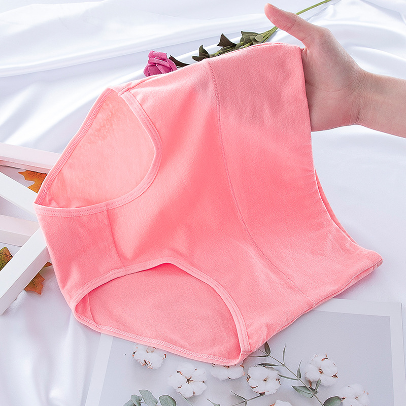 Ropa interior de algodón de las mujeres populares de otoño e invierno Ropa interior de algodón de cintura alta de las mujeres Levantamiento de cadera vientre contracción calzoncillos color sólido sin costuras más ropa interior de tamaño