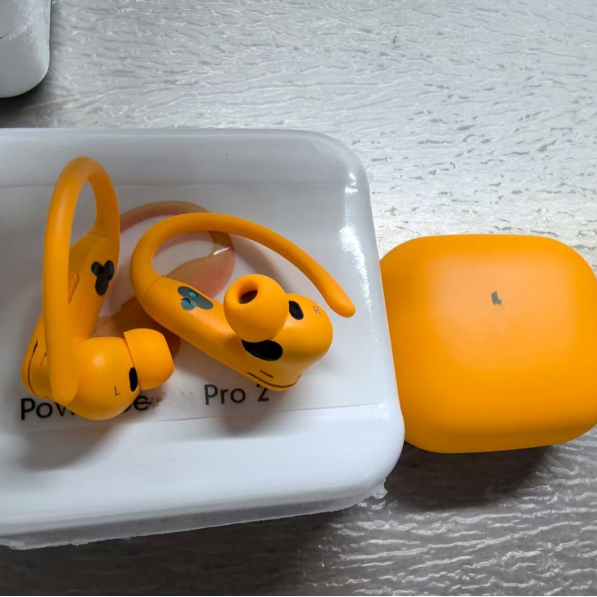 Nuevos auriculares Bluetooth inalámbricos Huaqiang NorthPower Pro2 con auriculares deportivos de ventana pop-up con marca B
