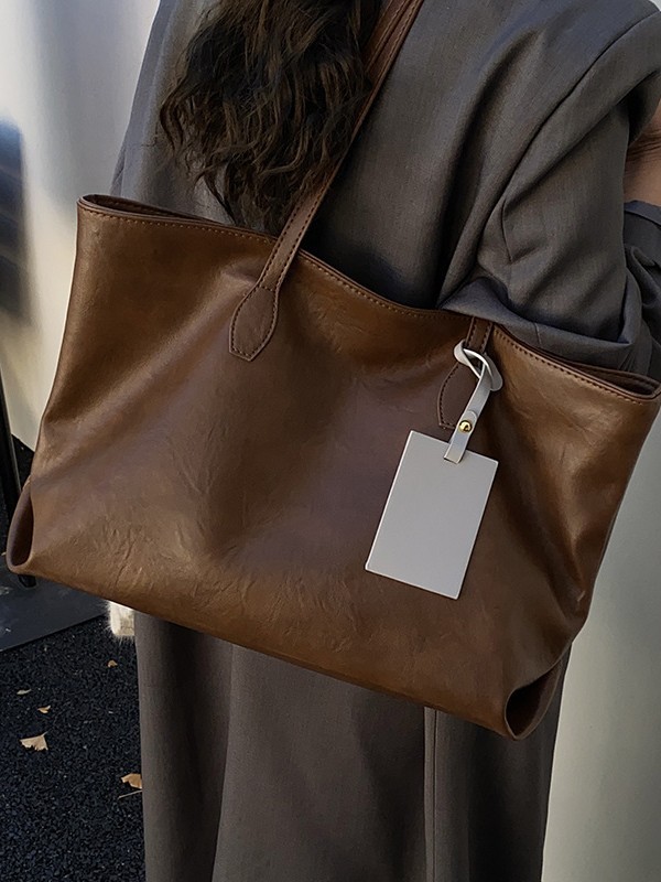 Bolso coreano de gran capacidad simple bolso de hombro para mujeres texturas sofisticadas de moda moda ocio bolso de viaje
