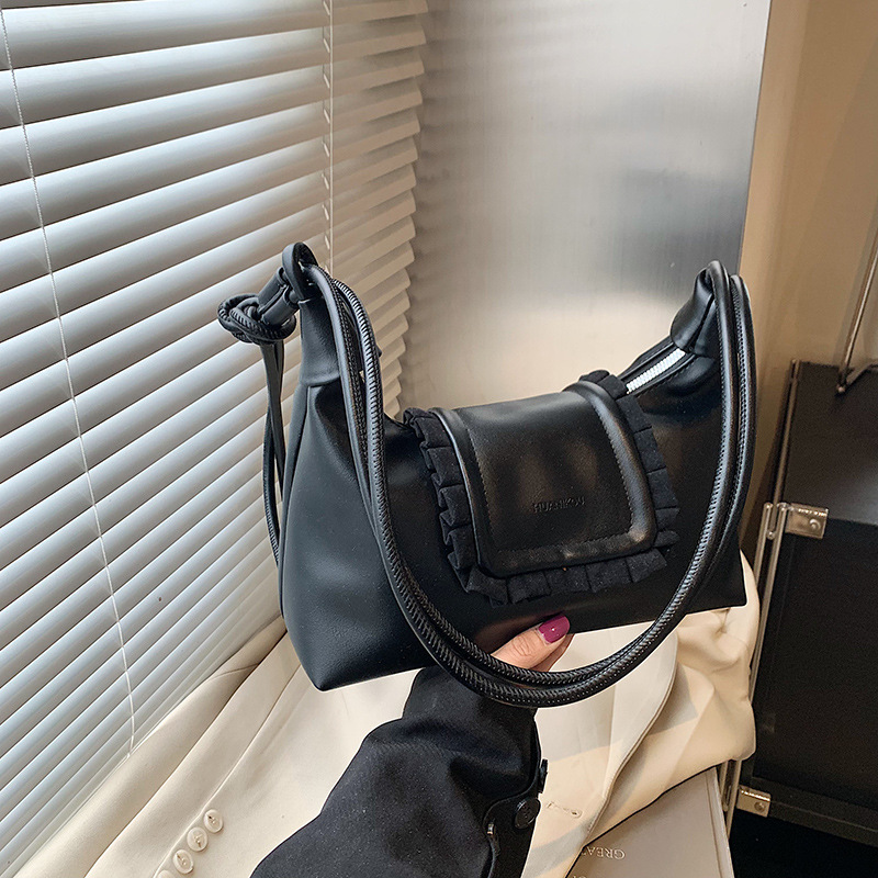 Nicho de diseño de cuerda de dibujo plegado bolso de nube de invierno 2024 nuevo estilo de moda extranjero bolso de hombro pequeño bolso de mochila mujer