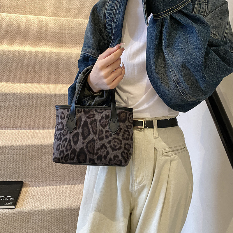Otoño y invierno super caliente leopardo bolso de mano para mujeres 2024 nuevo bolso de mano de trabajo bolso de cubo de hombro