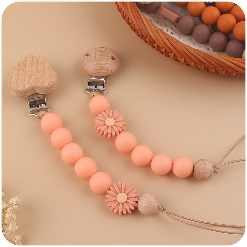 Nuevo bebé suministros de dibujos animados melocotón corazón Haya clip creativo DIY Daisy Arco Iris silicona pegamento mordedura cadena del pezón