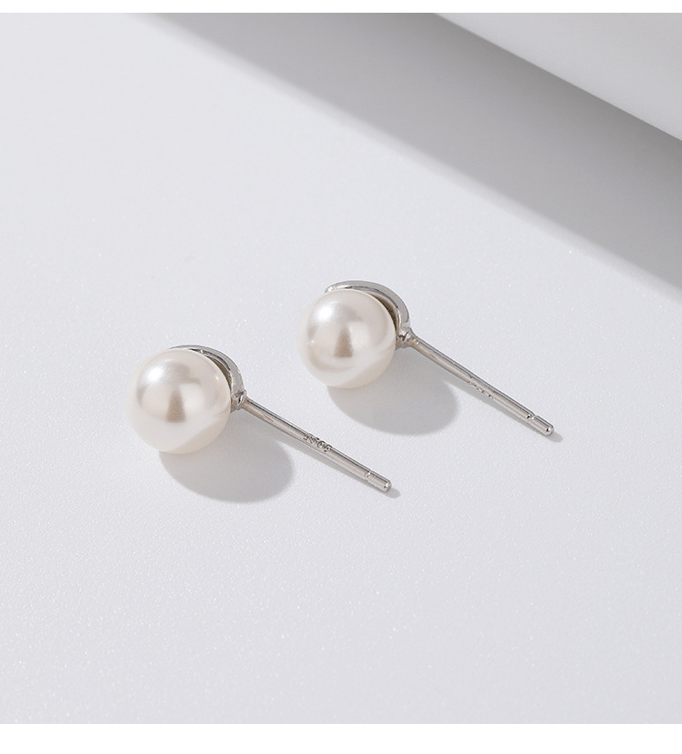 1 Pair Simple Style Geometric Solid Color Imitation Pearl Sterling Silver Ear Studs display picture 1