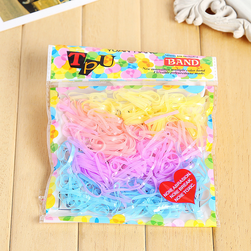Las bandas de goma desechables de color para niños no dañan el cabello, alta elasticidad y durabilidad