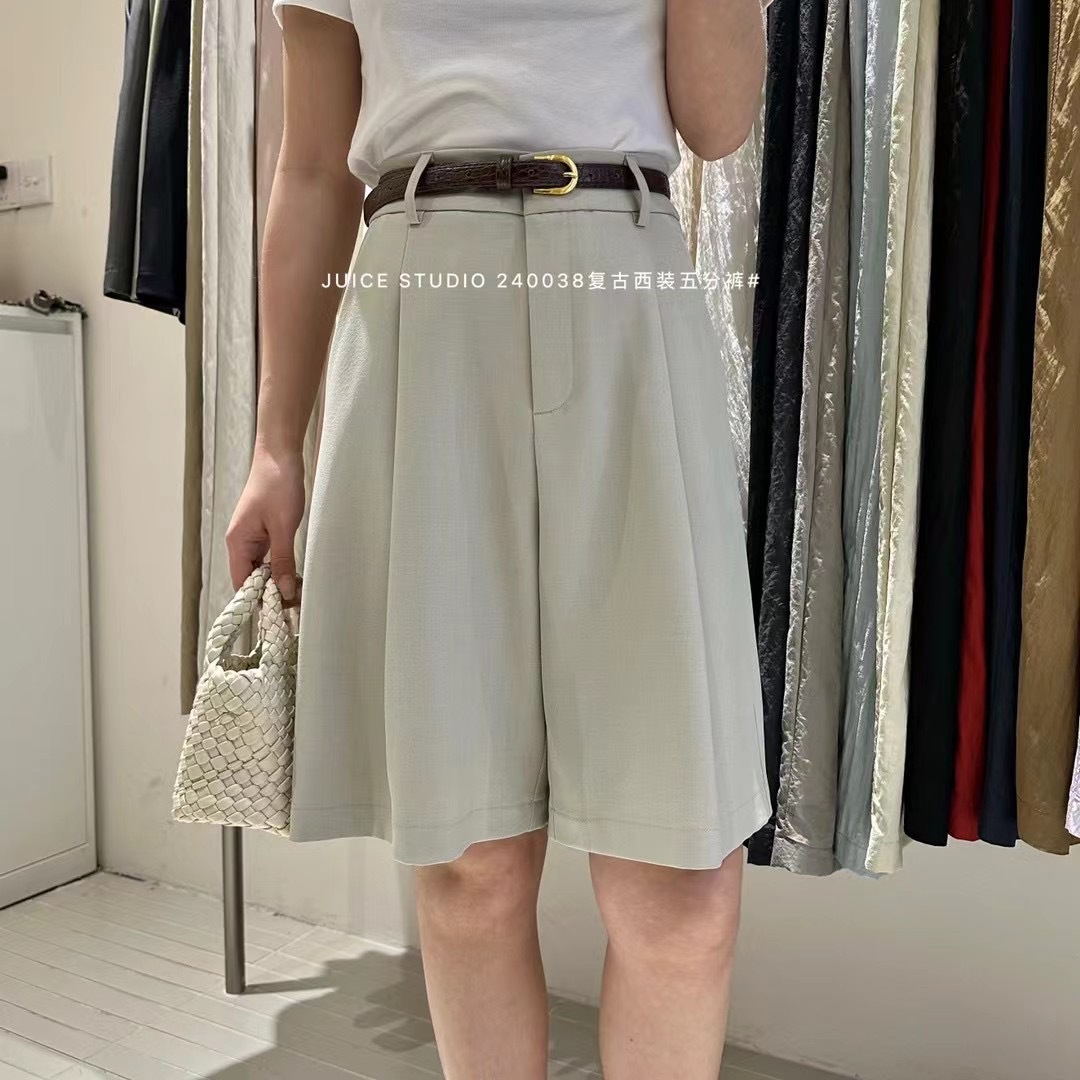 Liquidación sin devolución 240038 verano pantalones cortos casuales sueltos simples pantalones anchos delgados de cintura alta para mujer pantalones de cinco puntos