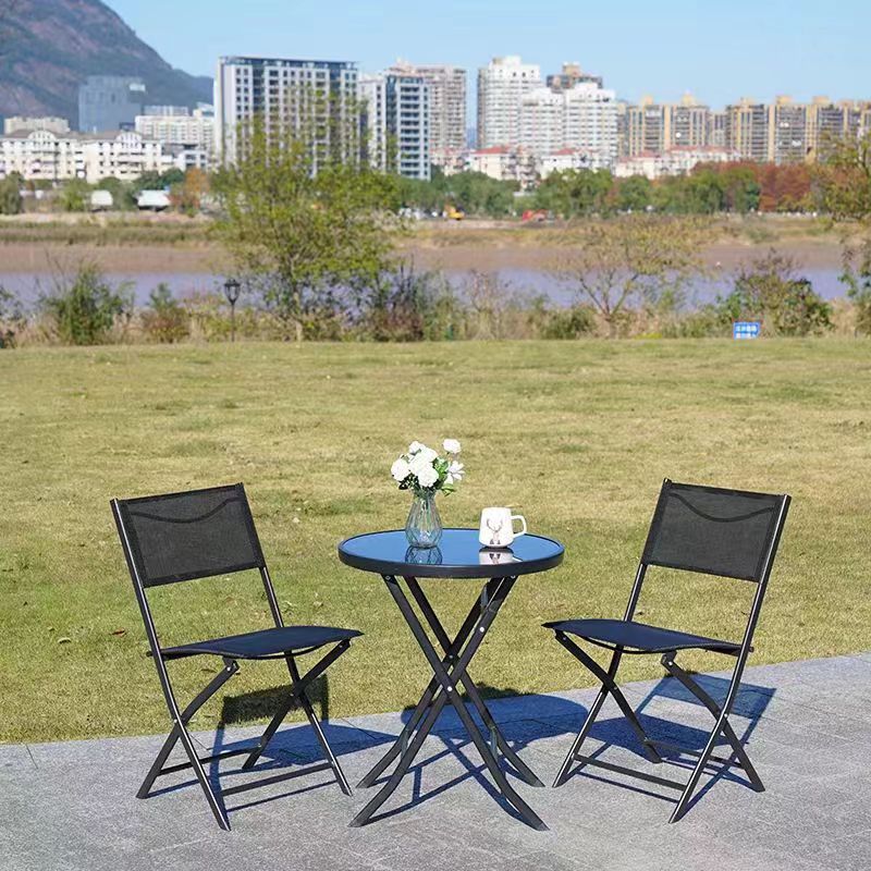 Conjunto plegable de mesa y sillas de hierro para exteriores