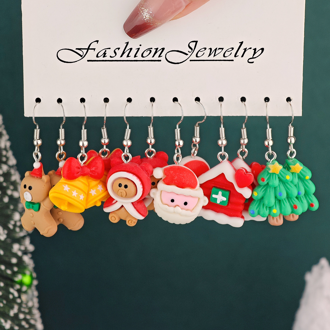 12pcs transfronterizos venta caliente pendientes de Navidad creativos Papá Noel muñeco de nieve lindo pequeño alce set de regalo