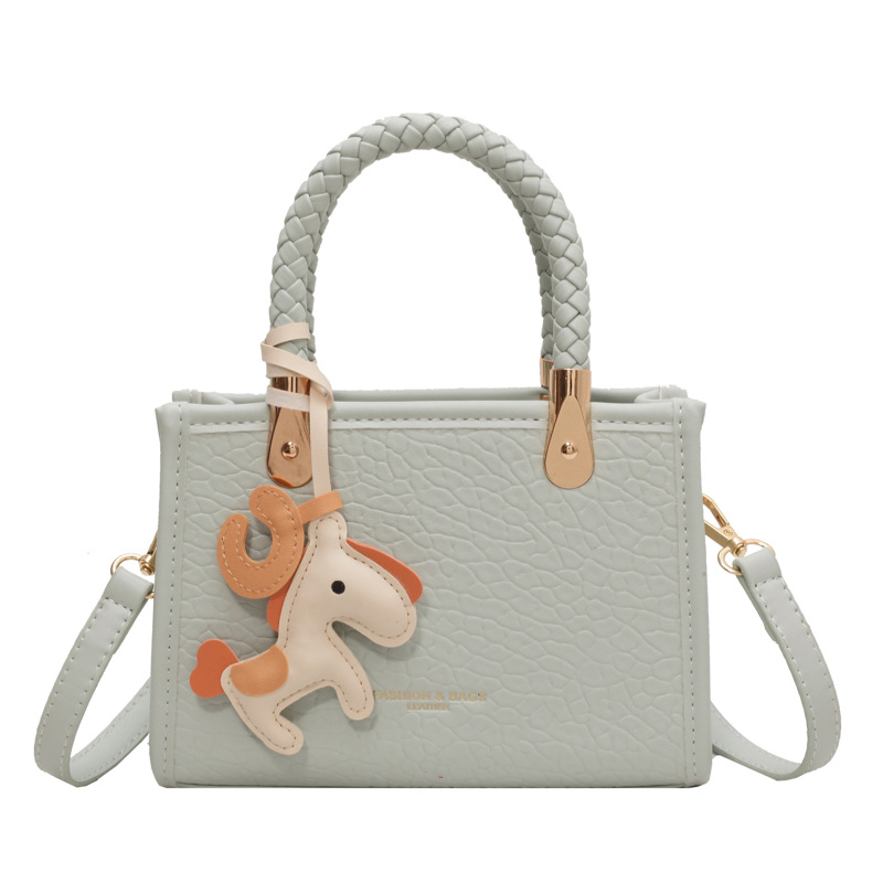 Bolso de mano transfronterizo para mujer 2025 nuevo estilo coreano simple y moderno bolso cuadrado pequeño bolso de mensajero de hombro de moda de viaje salvaje