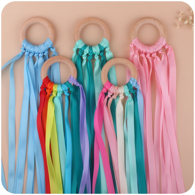 Nuevo bebé suministros cinta Beech sonajero calmante bebé creativo anillo de madera juguete dientes molienda Amazon