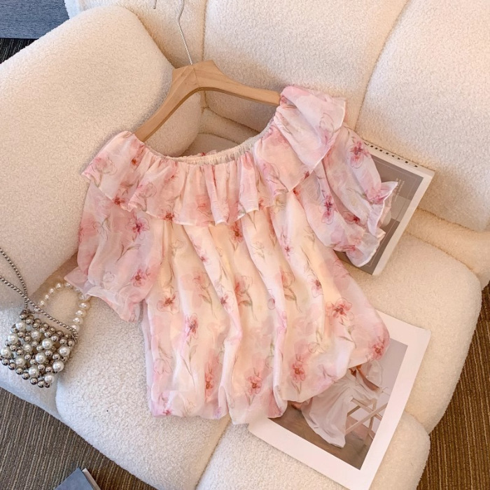 夏の太ったmmのゆったりした大きいサイズのシフォンの泡の袖のシャツの半袖の女性はやせている花を現します。|undefined