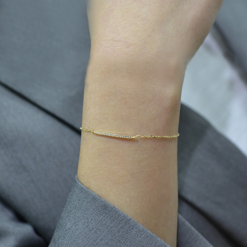 Nuovo bracciale in argento sterling placcato oro con fila di zirconi, design semplice, raffinato e ultra sottile e brillante._voghion.com