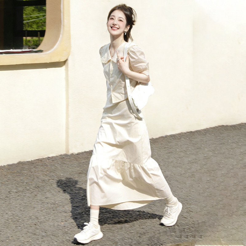 White Doll Collar Shirt and Skirt Two-Piece Set for Women, 2026 New Style, High-End and Very Beautiful Spring Outfit White Doll Collar Shirt and Skirt Two-Piece Set for Women, 2026 New Style, High-End and Very Beautiful Spring Outfit