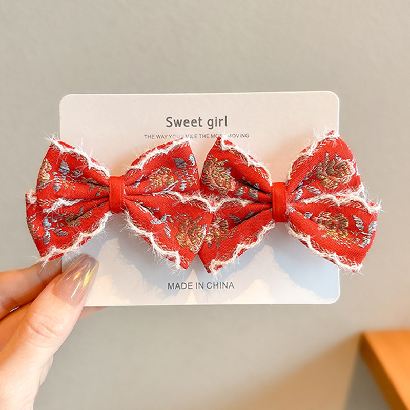 Clip rojo bordado al estilo chino