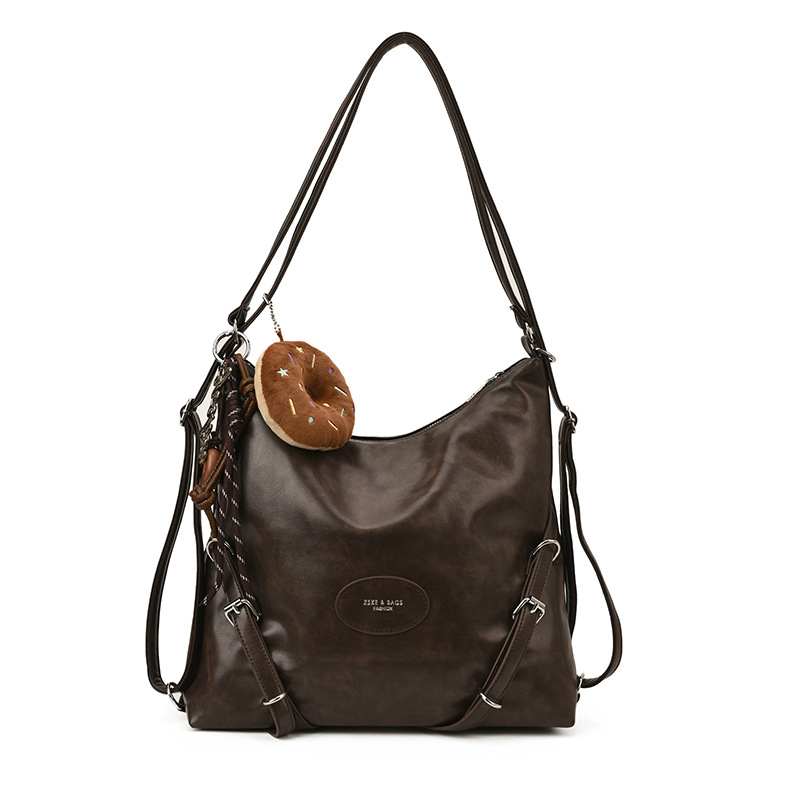 Mochila de viaje casual de mujer de gran capacidad mochila de cuero suave 2025 nueva mochila de estilo relajado retro versátil