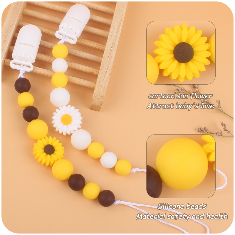 Suministros para bebés de dibujos animados flor mordedor calmante bebé de silicona mordedura pegamento molar Cadena de pezón cadena anti-caída Nuevo