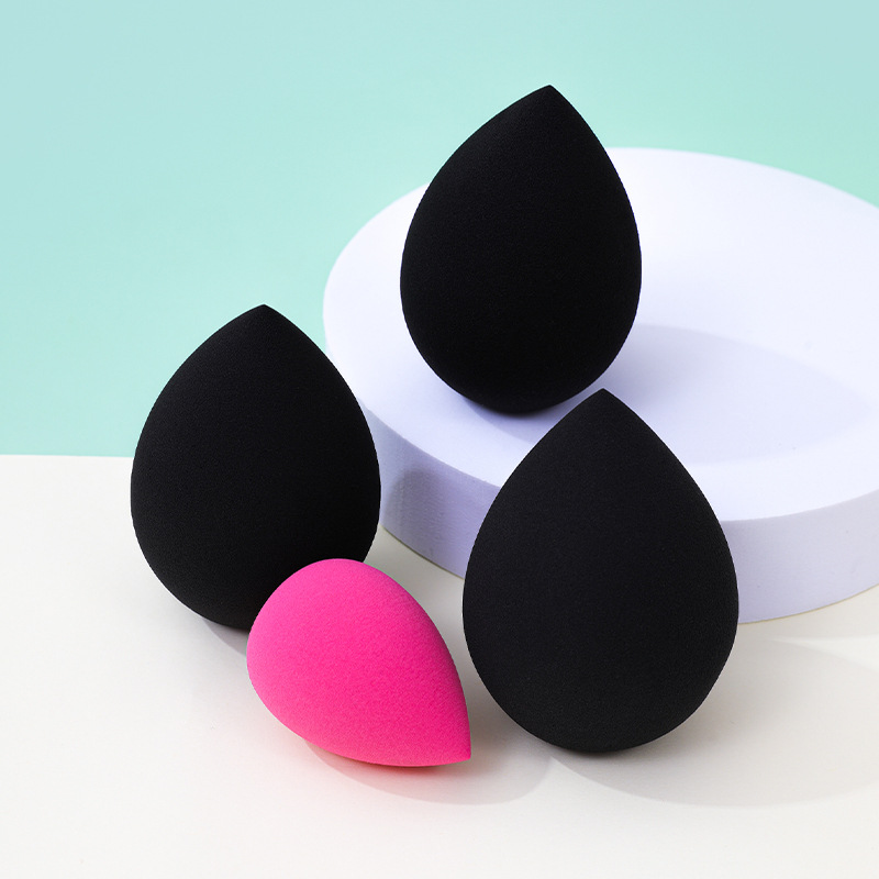 Fábrica personalizada gota de agua gigante polvo de huevo de maquillaje no puede comer polvo de maquillaje húmedo y seco de doble uso esponja de maquillaje huevo de maquillaje