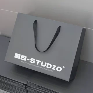 高级感服装店手提袋定制化妆品礼品袋高级感衣服购物礼盒包装纸袋