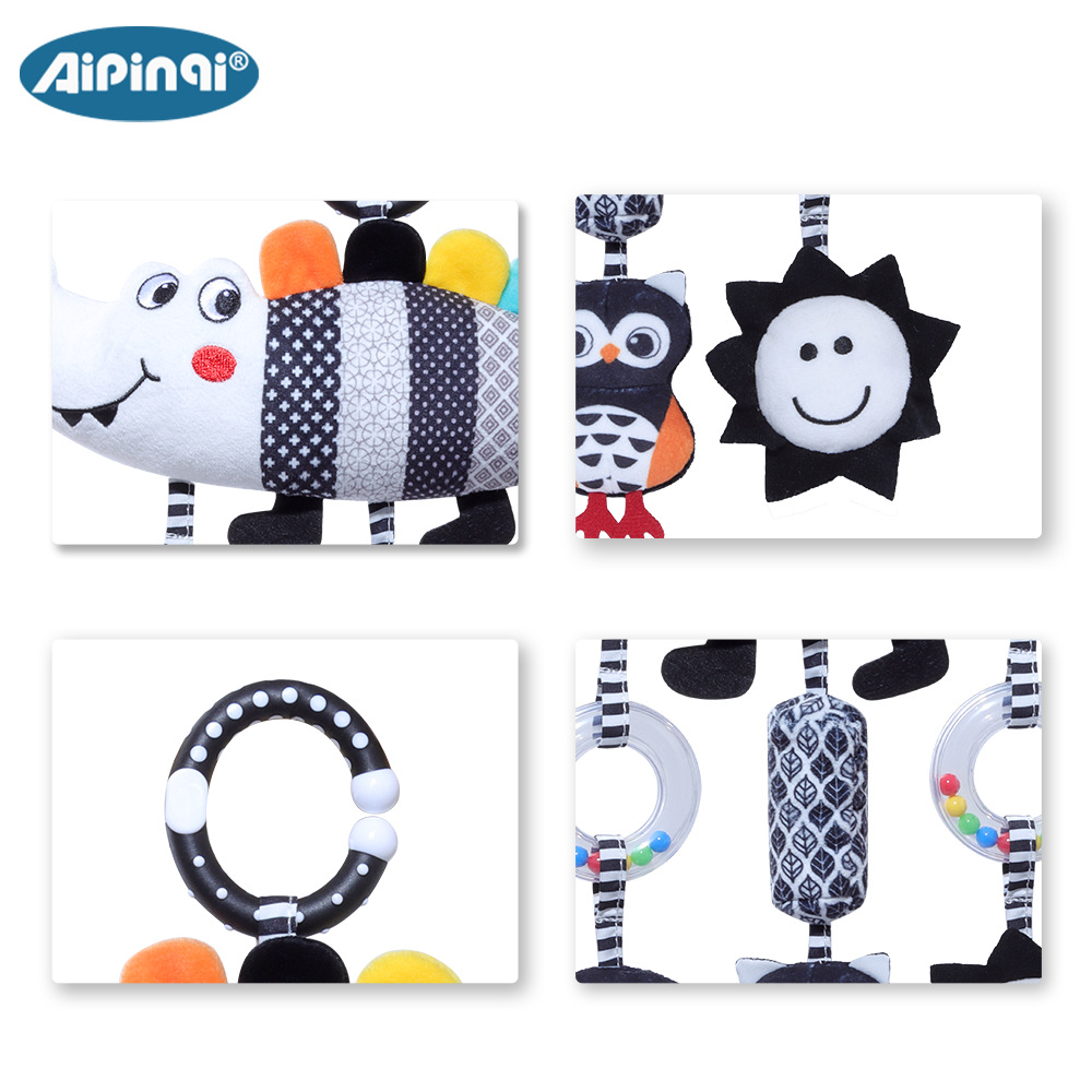 Aipinqi nuevo bebé blanco y negro campana de viento animal 0 - 3 años cocodrilo bebé juguetes de peluche al por mayor en stock