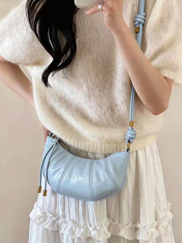 Bolsa de hombro elegante y exquisita, moda individual, bolso de corno de toro, explosión de alta calidad, bolso de brazo oblicuo de gran capacidad.