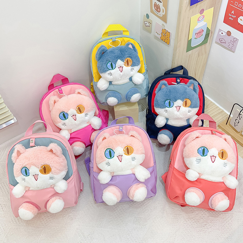 Nueva mochila de dibujos animados para niños tendencia pupila diferente gato muñeca mochila desmontable jardín de infantes en stock