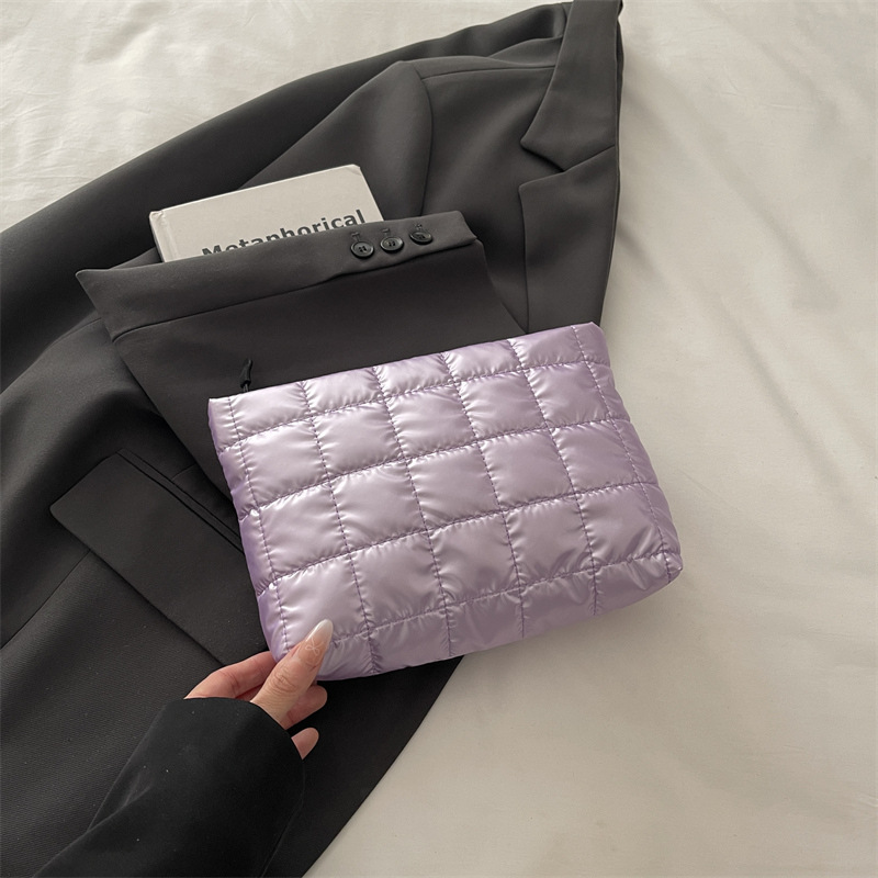 Bolsas de maquillaje de gran capacidad de ocio coreano 2025, nuevo diseño de nicho de moda simple bolsas de mano para mujeres
