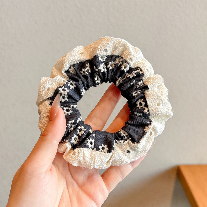 Pastoral viento intestino anillo de cabello mujer 2025 nuevo estilo de alta sensación bola de cabello cuerda de cabeza flor dulce princesa adornos de cabello cuerda
