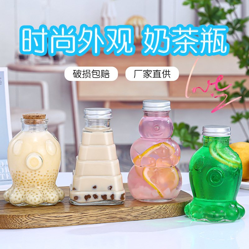 卡通造型奶茶瓶果汁饮料瓶透明玻璃瓶铝盖密封空瓶子雪人瓶子