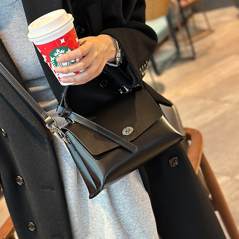 일괄 상단 레이어 Cowhide 잠금 핸드백 봄과 여름 새로운 하이 엔드 올 매치 숄더 백 통근 크로스 바디 백 여성용 가방