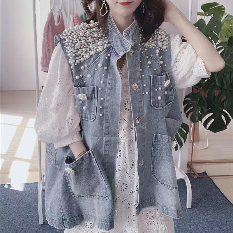 Denim vest for women 2022 spring and summer new heavy work shoulder Pearl Coat waistcoat loose BF jacket cardigan fashion Denim vest for women 2022 spring and summer new heavy work shoulder Pearl Coat waistcoat loose BF jacket cardigan fashion