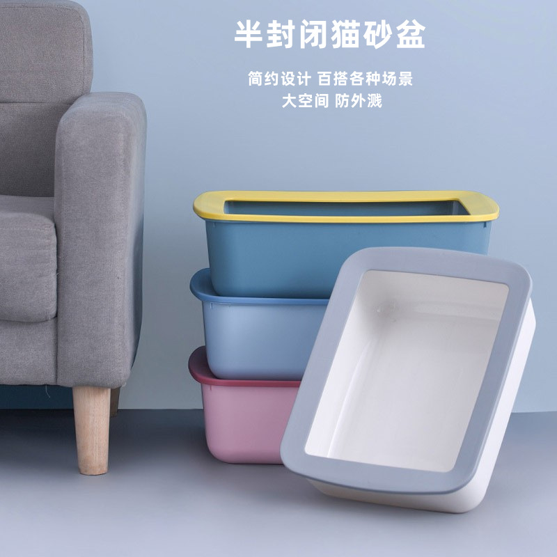 La caja de arena para gatos semicerrada de gran tamaño anti-salpicaduras, el inodoro para gatos, la arena y el olor