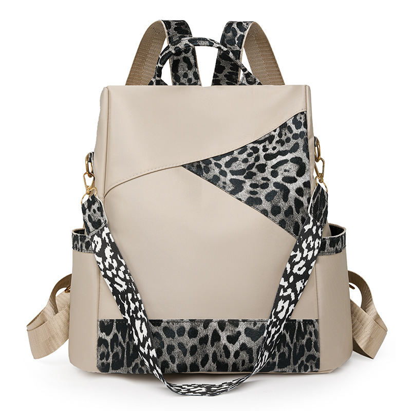 Nueva mochila con estampado de leopardo para mujer 2024 nueva mochila de viaje de todo fósforo de moda de gran capacidad mochila escolar para estudiantes de un solo hombro