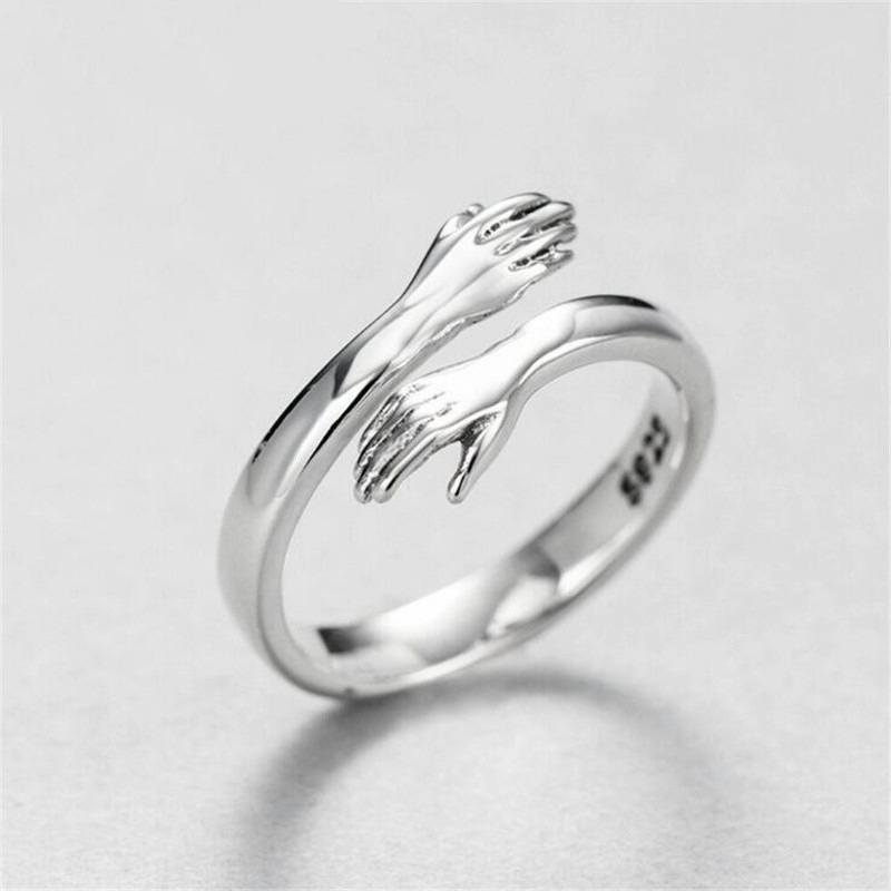 厂家直销新品镀银戒指创意拥抱你爱的拥抱怀抱手臂手开口可调戒指