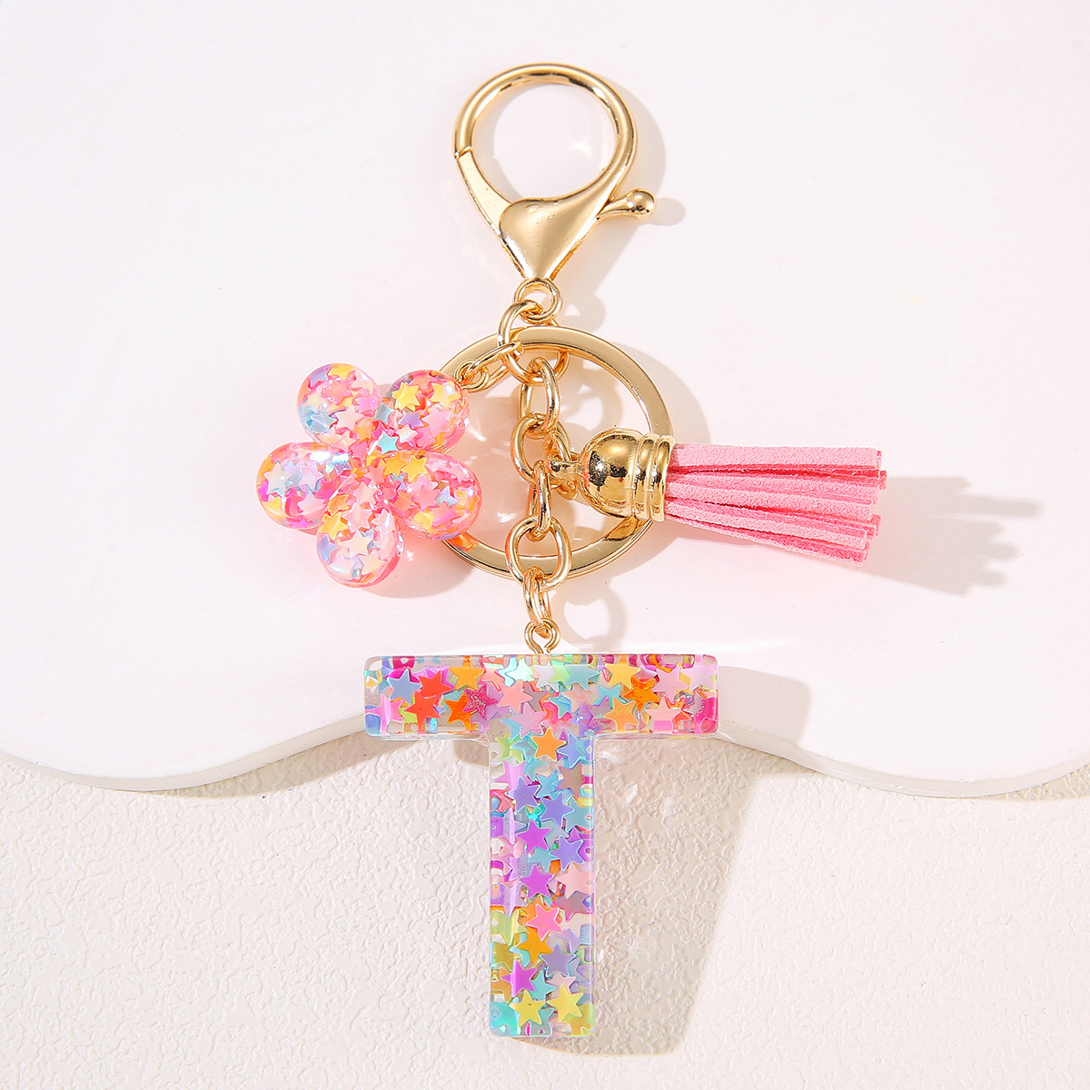 Un nuevo llavero flor de goteo de goma esquinilla 26 letras bolsos colgante llavero accesorios Yiwu