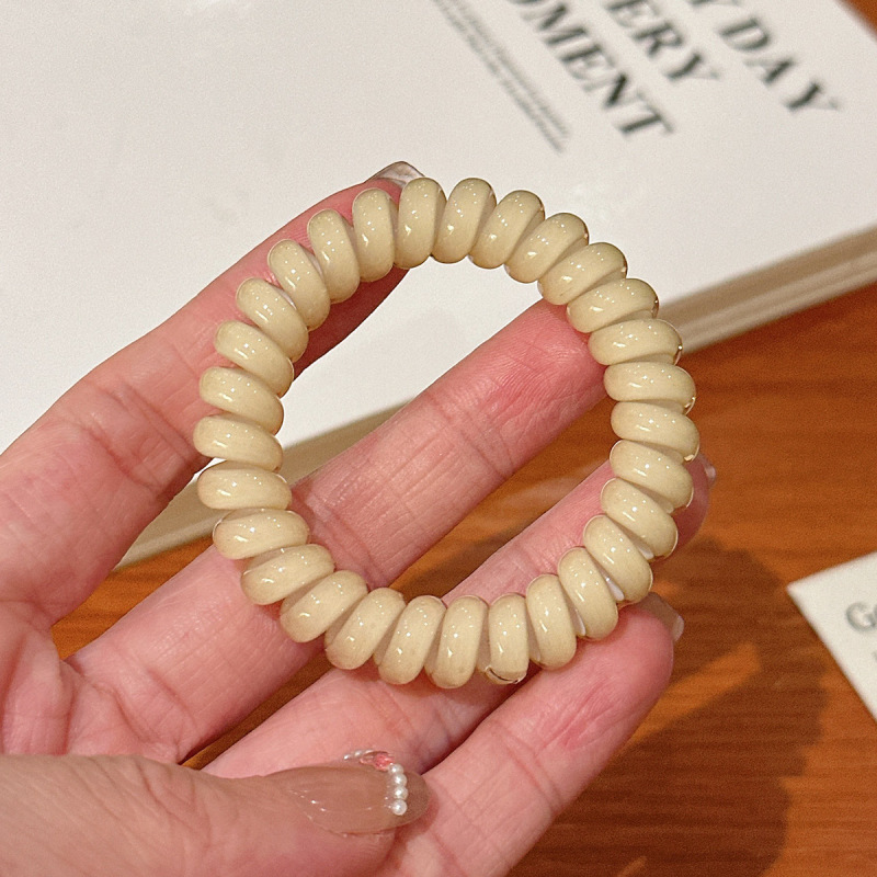 キャンディー色の電話線の髪輪の女性は高弾力で長持ちします。|undefined