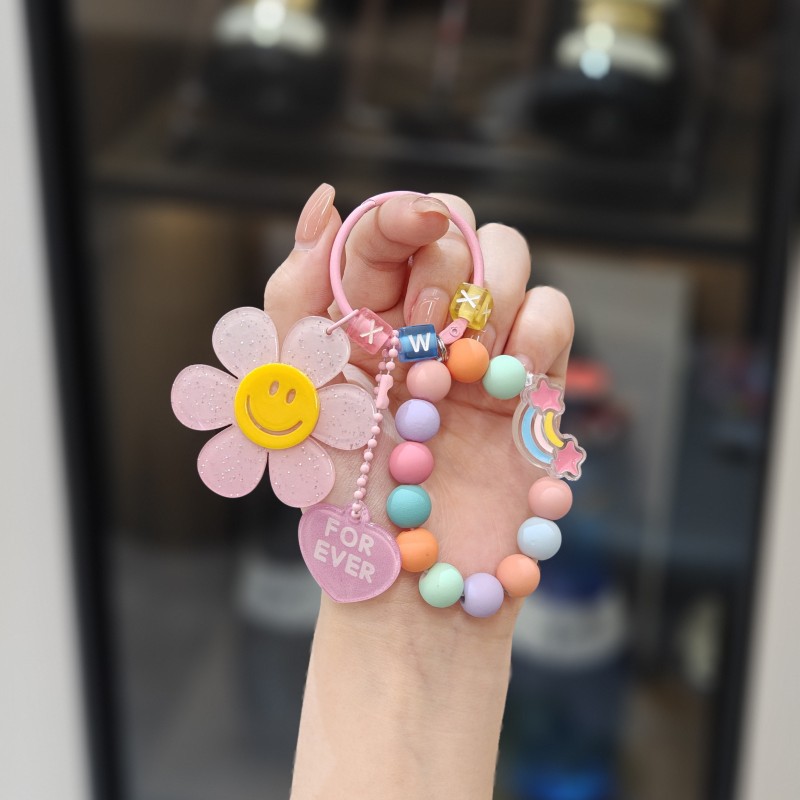 Cartoon solar flor de sol brazalete de cuentas arco iris creativo llavero de automóvil bolsos de pareja de mujeres colgantes de automóvil pequeños regalos