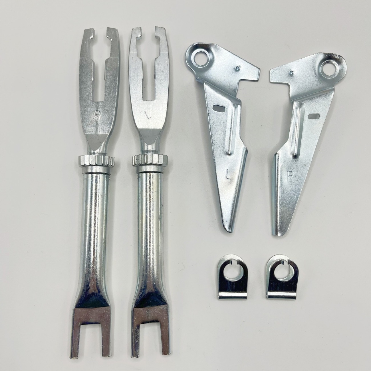 Adecuado para Toyota vigo4wd freno trasero palanca de ajuste pinza kit de reparación 04943-ok130/ok030 freno trasero