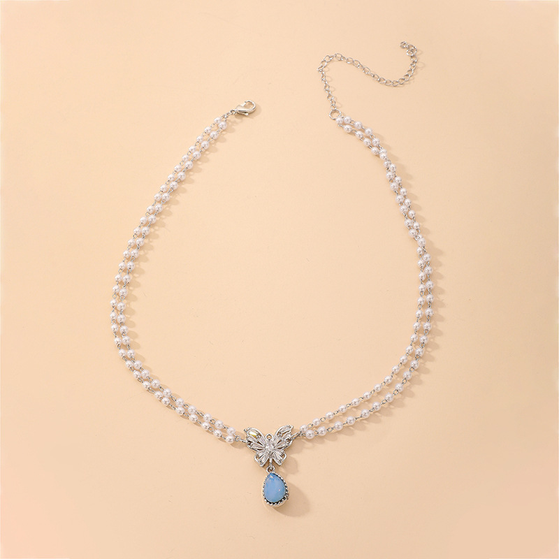 Wholesale Jewelry Double-layer Pearl Butterfly Blue Water Drop Pendant Necklace Nihaojewelry display picture 3