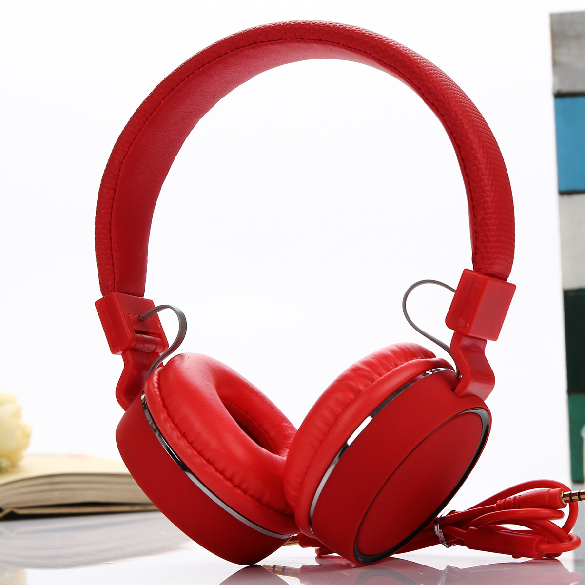 Venta directa de fábrica de auriculares, cable de color caramelo, auriculares plegables con marca, exclusivo transfronterizo