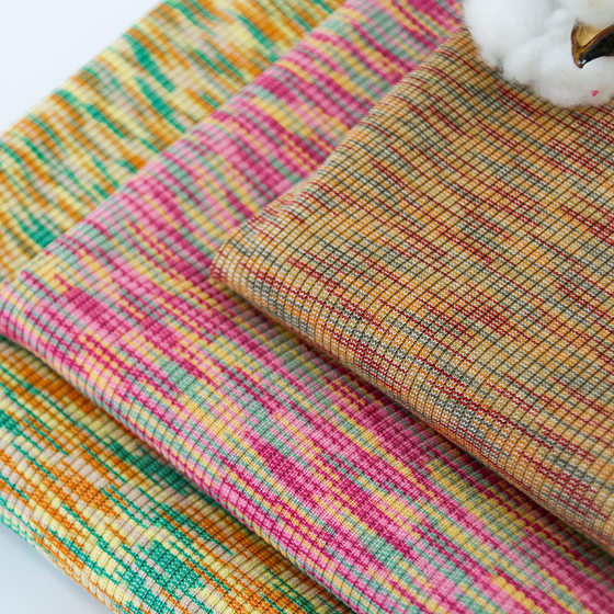 Double-sided fine needle pit flower yarn rainbow strip 180g super soft elastic rib fashion brand women's sweater fabric
