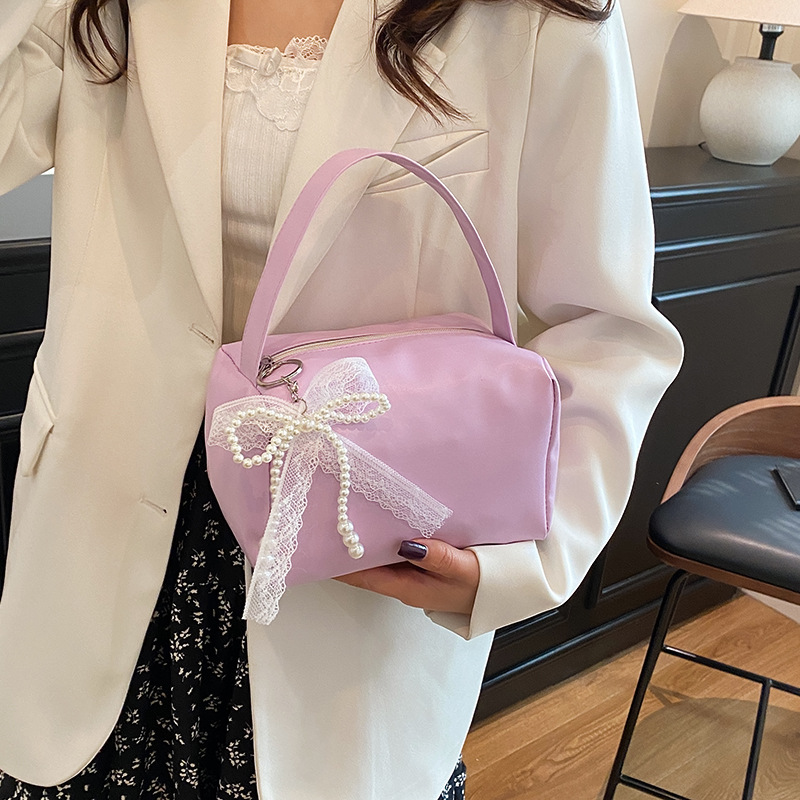 Nicho Zhong fresco dulce bolso de braza para mujeres 2025 primavera y verano nuevo estilo de alta calidad de moda de viaje de hombro bolso de mujer estilo extranjero