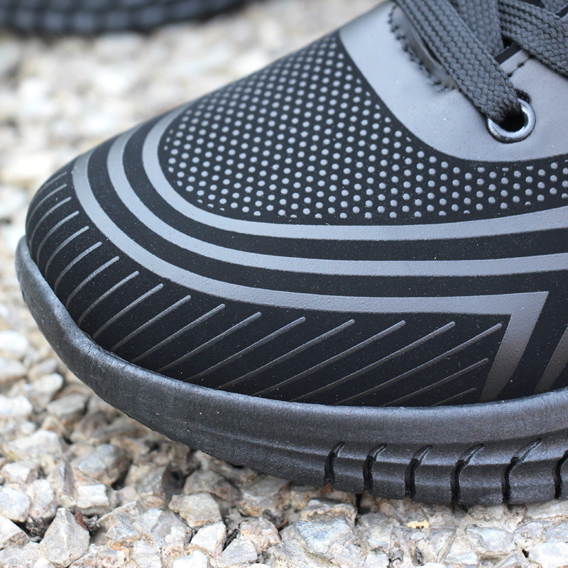 Zapatillas de deporte de entrega de una pieza zapatos de hombre Otoño e Invierno zapatos casuales de fondo suave zapatos impermeables de cuero negro zapatos para correr hombres transfronterizos