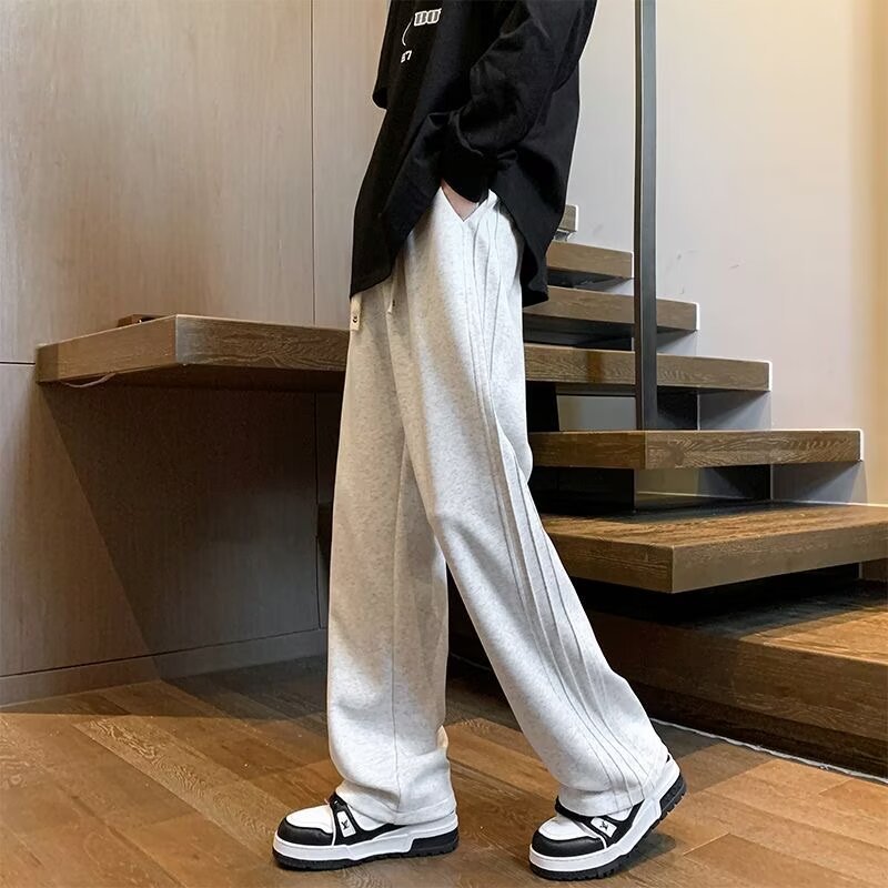 Otoño y invierno nuevo estilo de tendencia pesada para hombres pantalones de calzado de pierna sueltos y versátiles rectos con lana casuales