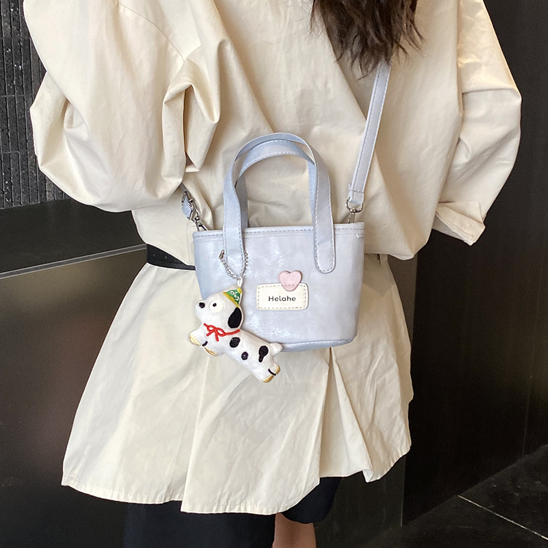 Bolso de moda coreano para niños y niñas simple color sólido pequeño y ligero bolso de cestas de bebés nuevos accesorios para niños bolso