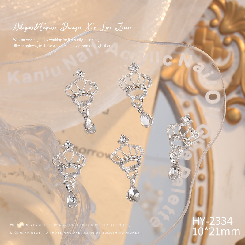 Nueva joyería de aleación de manicura completa diamante borla arco corona plata uñas manicura joyería accesorios al por mayor