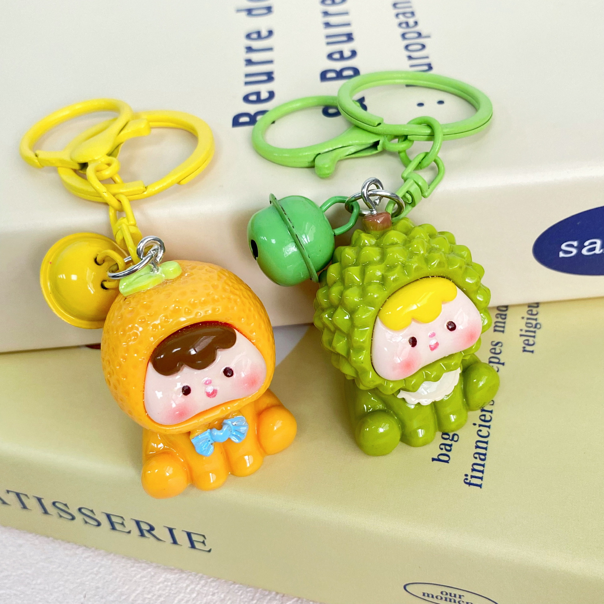 新商品の立体果物の子の鈴の鍵は少女の心の学生を掛けて親友のプレゼントを飾ってカップルを掛けます。