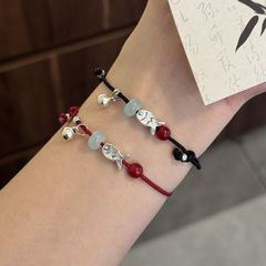 かわいい魚躍龍門鈴のブレスレットは岸にあります。